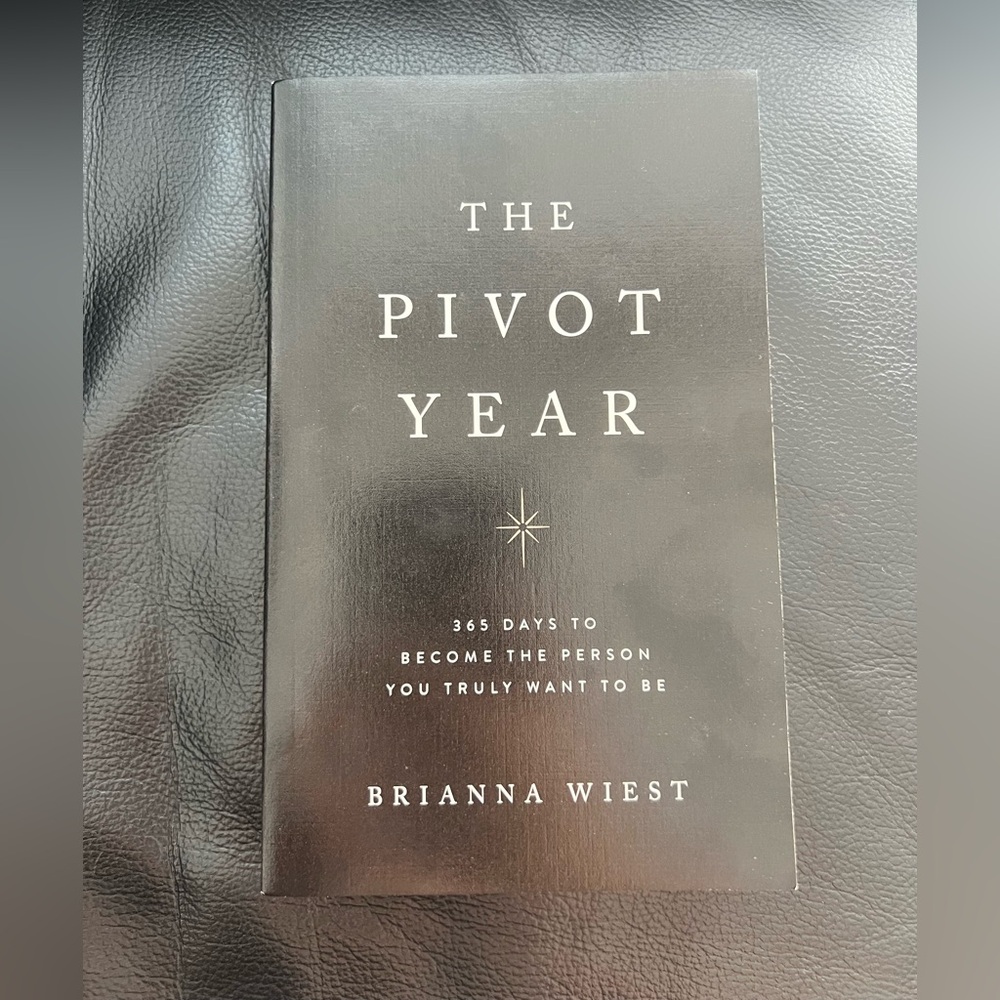 "The Pivot Year" - Black Softcover Book